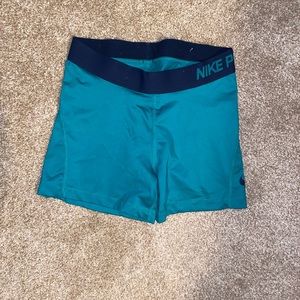 Size medium dry fit Nike pros